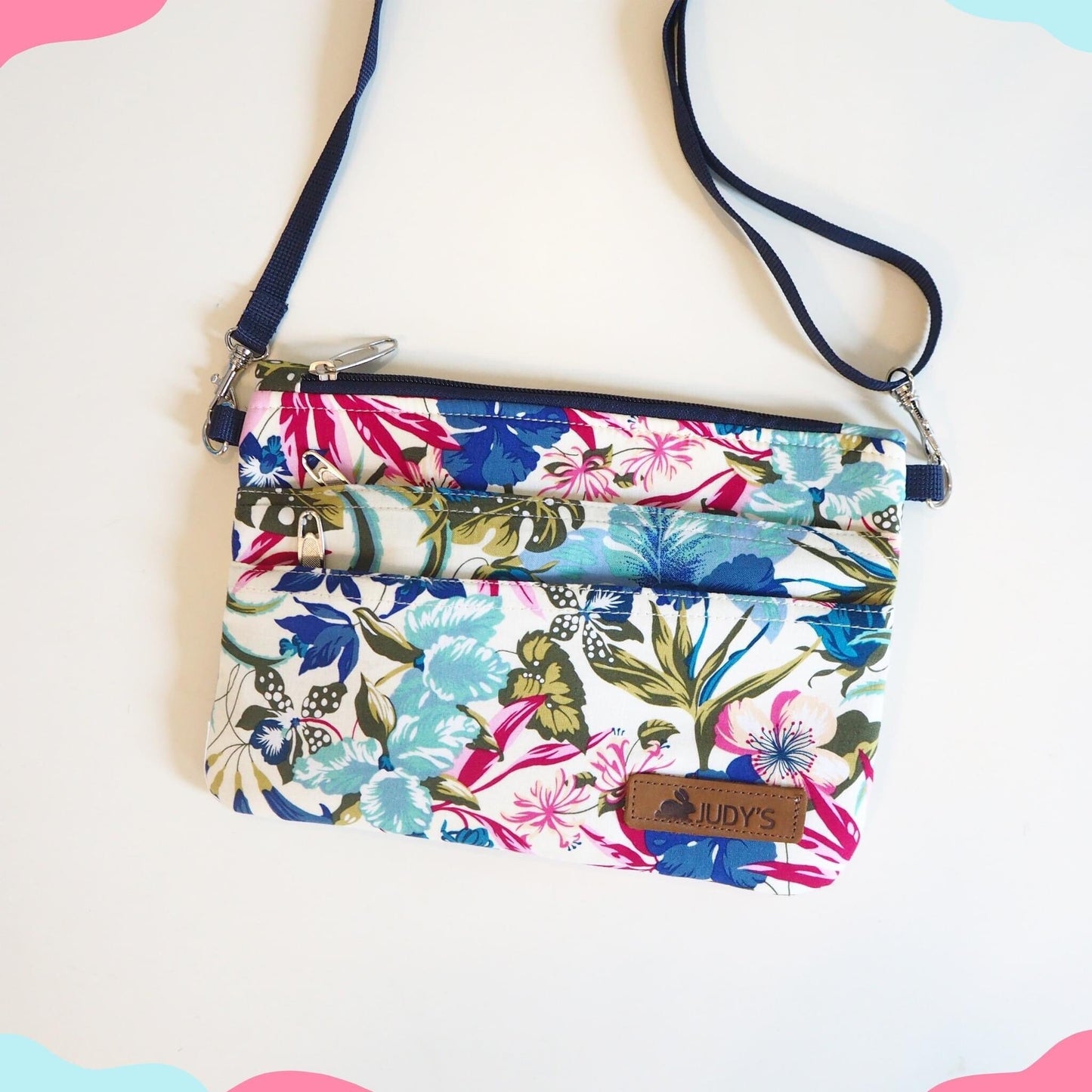 Cross Body bag in Pink Blue and Green Jungle pattern.