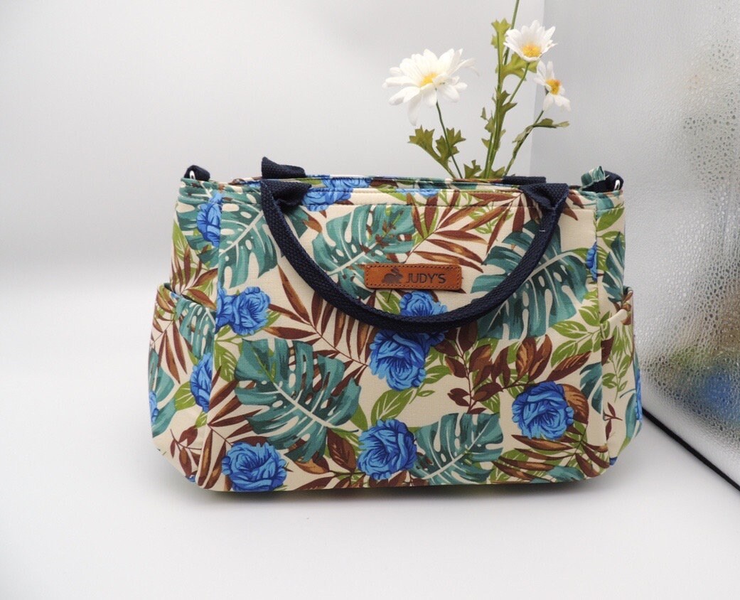 Elegant Water Drop Shape Medium Handbag in Blue Flower with brown and green leaves pattern