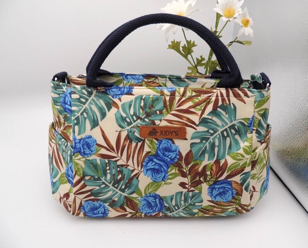 Elegant Water Drop Shape Medium Handbag in Blue Flower with brown and green leaves pattern