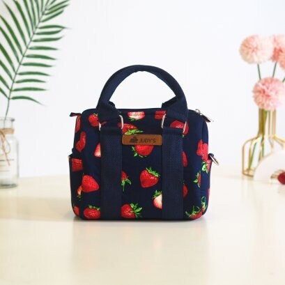 Small Pillow Bag  Crossbody or Shoulder Bag in Blue with Strawberry pattern.