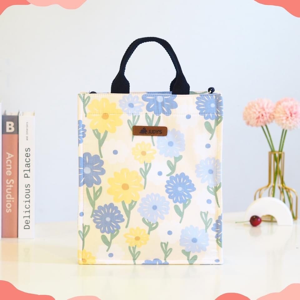 iPad handbag in a Blue and White flower on light background design.